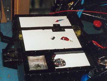 Insulation on top of the fuel tank.